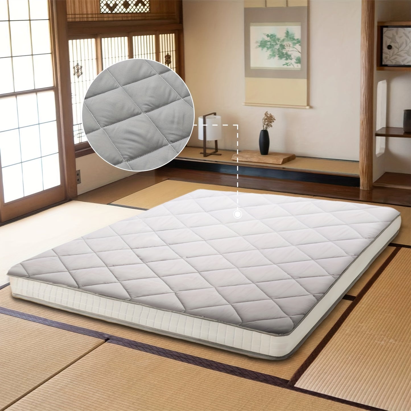 Mattress pad on a tatami mat floor with a close-up of the quilted texture.