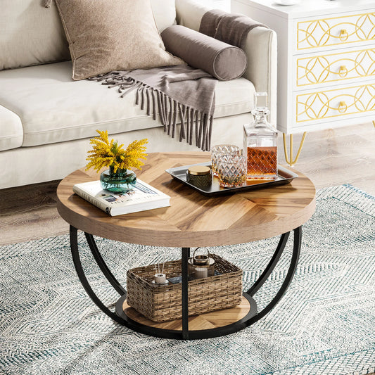Round coffee table with wood and white finish in modern living room with grey sofa and yellow flowers
