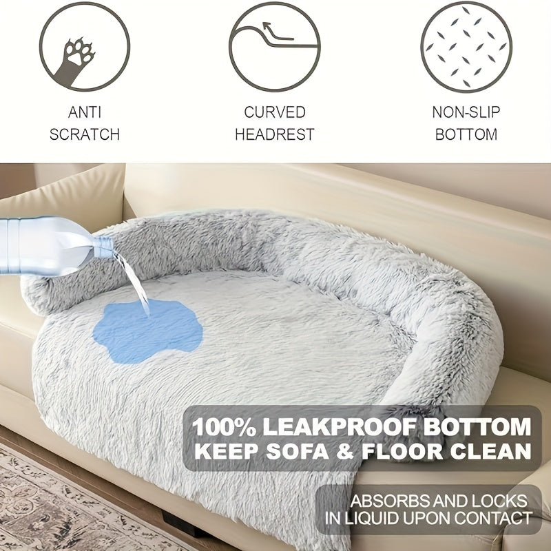 Gray pet bed with anti-scratch, curved headrest, and non-slip bottom features on a sofa.
